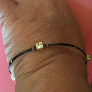Elegant Gold and Black Bracelet